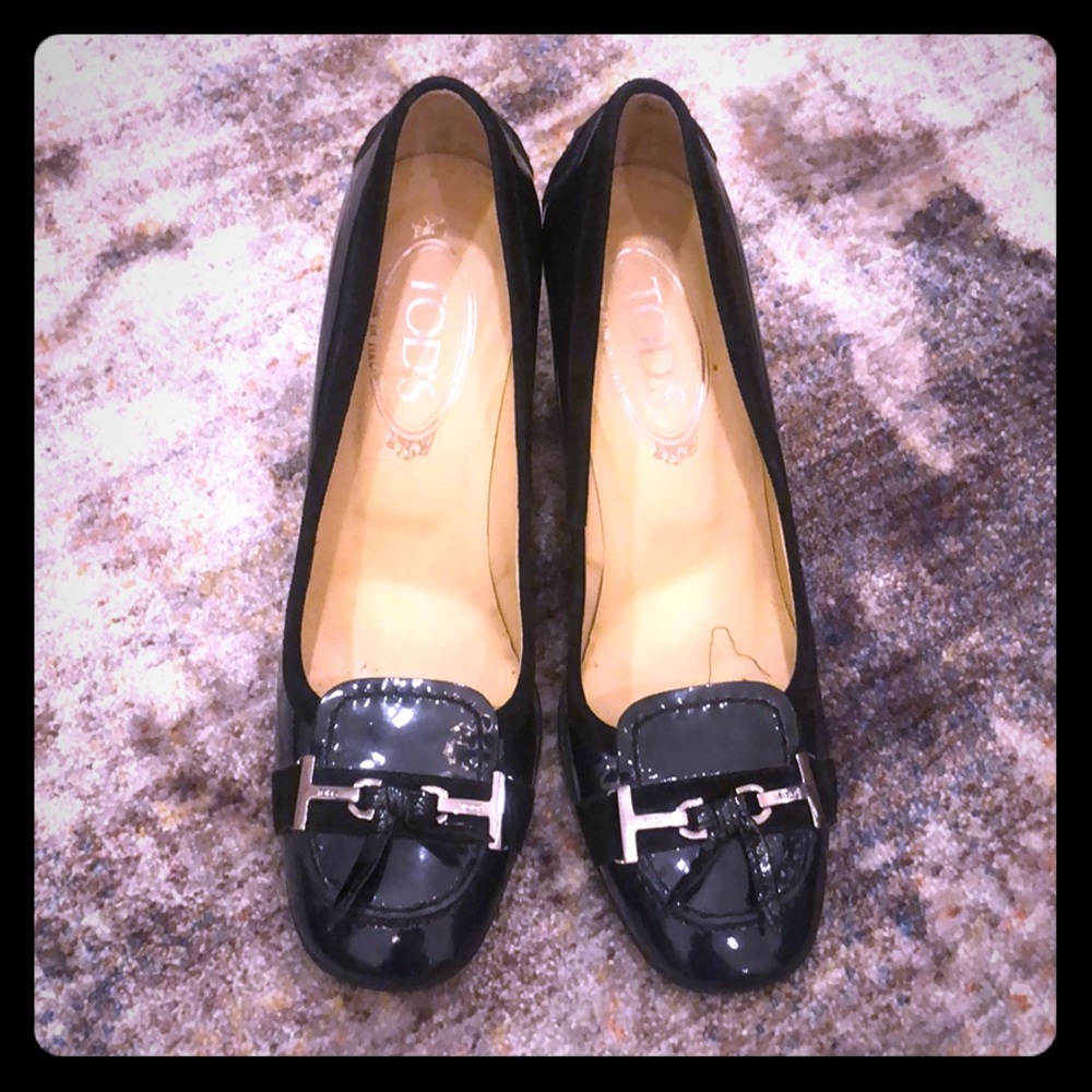 Tod’sblack patent leather high heels.